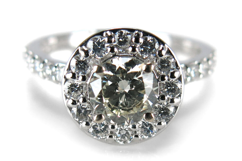 Ring Brillant 0,70 ct + Brillanten insg 0,53 ct IGI Gutachten [BRORS 16570]