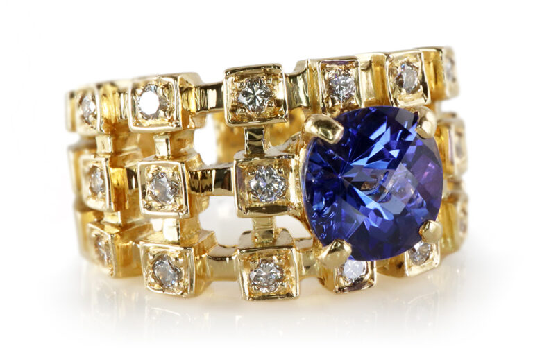 Ring Tansanit 2,5 ct + 20 Brillanten 0,40 ct G-H/VVS 750 Gelbgold [BRORS 19479]