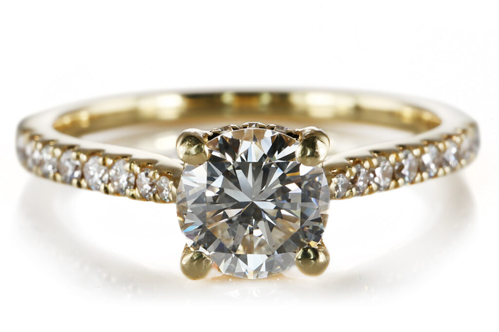 Ring 1 Brillant 0,59 ct H/VVS2 + Brillanten 750 Gold DPL Gr. 53 [BRORS 20711]